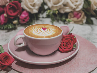 cup of coffee with roses
