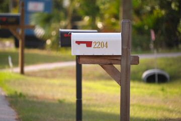 Typical american outdoors mail box on suburban street side