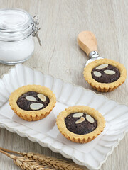 Delicious chocolate mini pies with almonds
