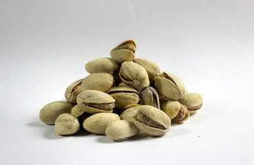 Pistachio nuts. Isolated on white background.