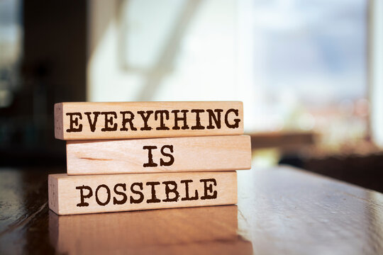 Wooden blocks with words 'Everything is Possible'.