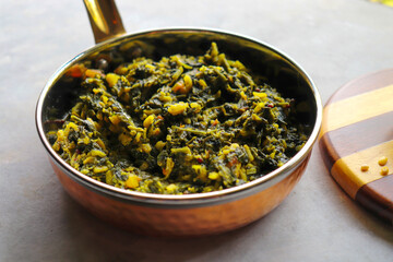 Palak and Moong dal sabzi. also known as spinach and lentil curry. Healthy green leafy vegetables Saag. Copy space. 