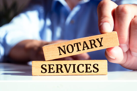 Wooden blocks with words 'Notary Services'.
