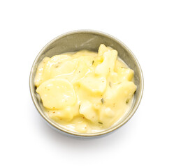 Bowl with creamy potato salad on white background