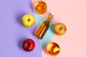 Composition with ripe apples, bottle and glasses of fresh juice on color background