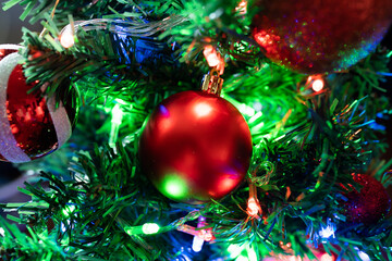 A red bauble on Christmas tree