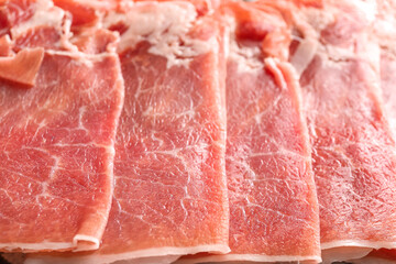 Slices of delicious ham as background, closeup