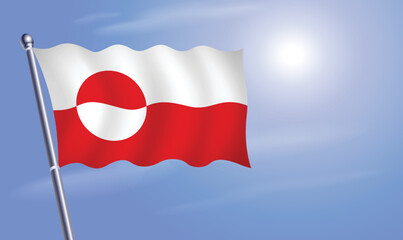 Greenland flag against a blue sky