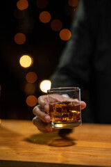 Barman pouring whiskey whiskey glass beautiful night