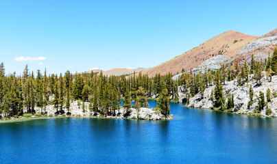 Scenic elevated panoramic view of Skelton Lake and Sierra Nevada mountains near Mammoth Lakes, California
