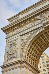 Fototapeta na wymiar Detail of top corner of limestone Washington Square Park arch in New York City