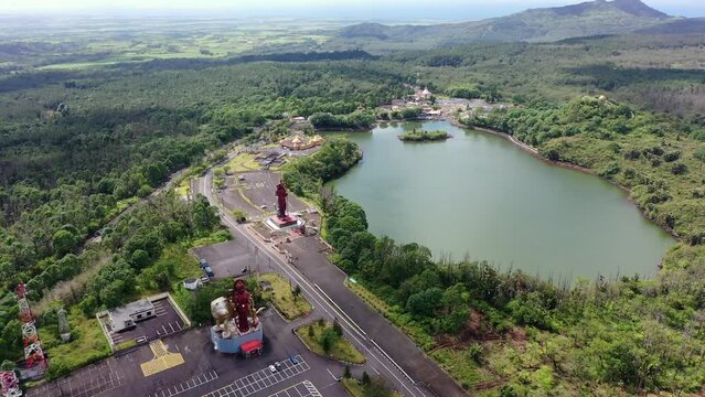 aerial video view of area around Ganga Talao ( Grand Bassin) a crater lake  in district of Savanne, Mauritius with 
"The She Mandir" temple dedicated to Lord Shiva and other temples. K4 footage