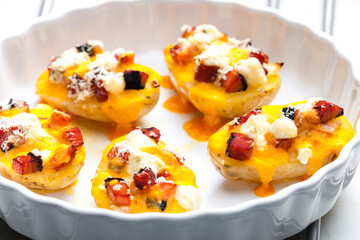 baked potatoes filled with cheese and bacon