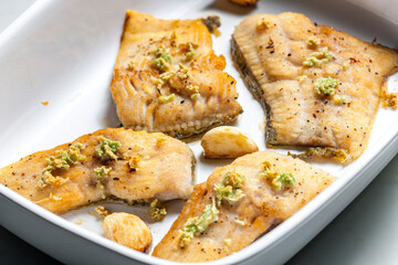salmon trout baked with garlic