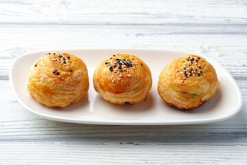 Homemade turkish piesl pogaca with sesame seeds