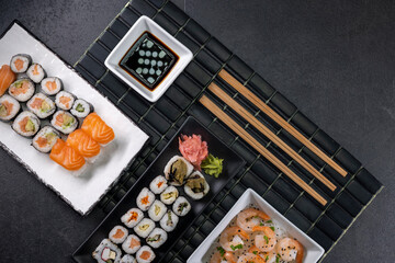 Various dishes of Asian cuisine with typical sushi