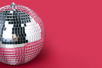 Disco ball on red background