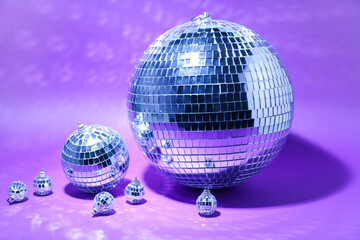 Disco balls on purple background