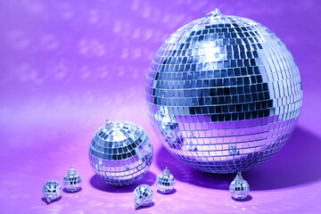 Disco balls on purple background