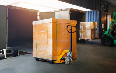 Packaging Boxes Wrapped Plastic on Pallets Loading into Cargo Container. Distribution Supplies Warehouse. Shipping Trucks. Supply Chain Shipment Boxes. Freight Truck Logistics Cargo Transport.	
