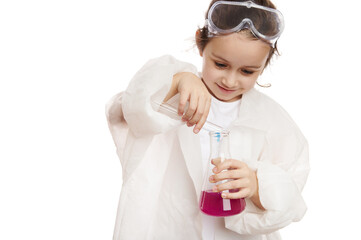 Smart little girl in lab coat, pouring a chemical reagent from test tube into flat-bottomed flask with purple liquid substance while doing experiments in chemistry class, isolated on white background