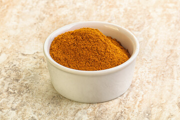 Dry Paprika powder in the bowl