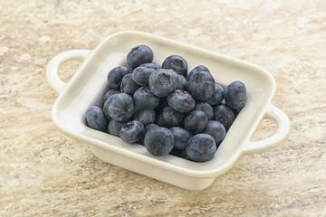 Sweet ripe blueberry heap in the bowl