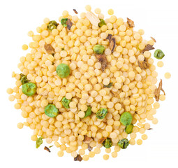 Raw pearl couscous with peas and dry mushrooms, white background, top view