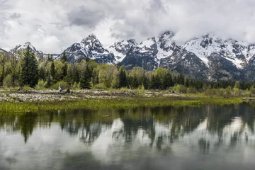 Fotobehang Mountains reflecting in Grand Teton National Park © Fyle