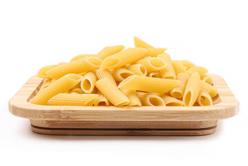 Pasta on a wooden plate, white background
