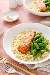 Salmon fillet grilled with bulgur and green beans. Healthy food, diet