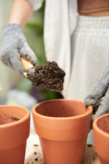 Filling Flower Pots with Soil