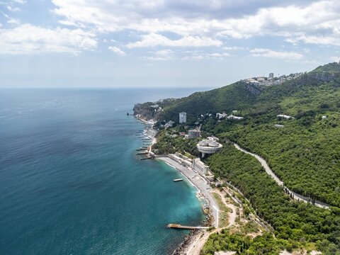 Christian church in the mountains above the sea. Temple of the Holy Archangel Michael in Oreanda. The southern coast of Crimea. Aerial view