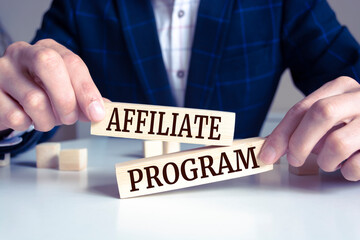 Obraz premium Wooden blocks with words 'affiliate program'.