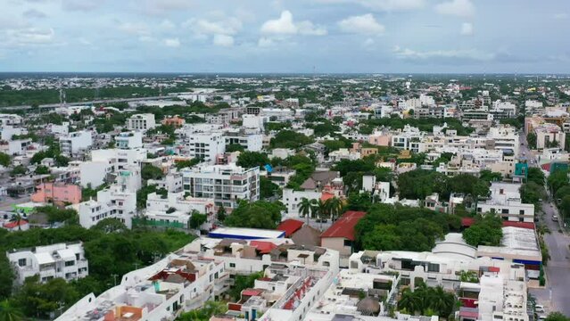 aerial skyline view of buildings in Playa del Carmen town on overcast day