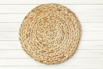 Round wicker mat on white wooden table, bohemian background mockup, backdrop for product, design,...