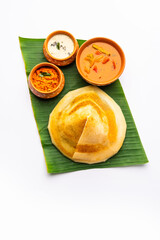 Cone shape dosa, also called dosai, dosey, or dosha, is a thin pancake in South Indian cuisine