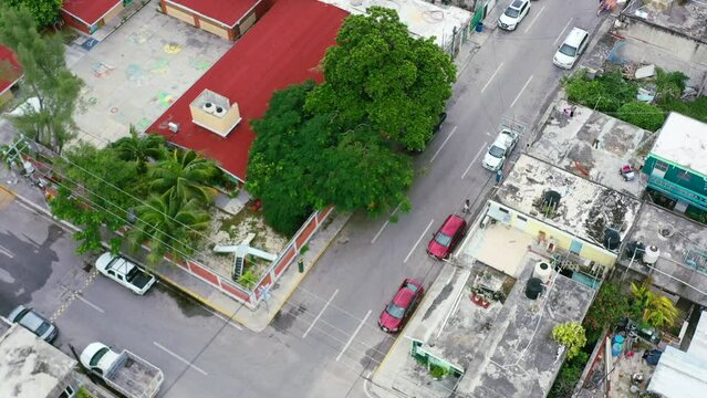 cars parked in residential streets in Playa del Carmen Mexico, aerial top down