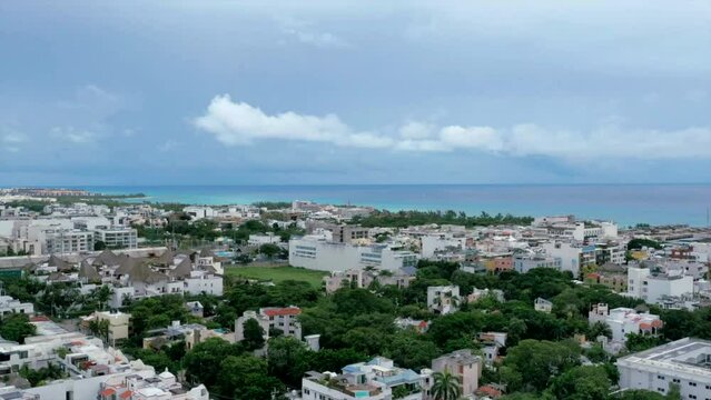 aerial hyper lapse of Playa del Carmen coastline on dark stormy afternoon