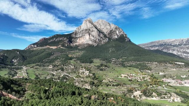 Idyllic Saldes village, Catalonia with majestic Pedraforca Stone pitchfork mountain landscape aerial view