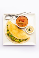 A dosa, also called dosai, dosey, or dosha, is a thin pancake in South Indian cuisine
