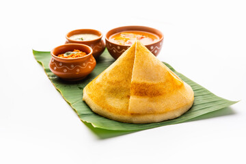 Cone shape dosa, also called dosai, dosey, or dosha, is a thin pancake in South Indian cuisine