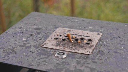Street Litter Bin with Ashtray Full of Cigarrete Butts
