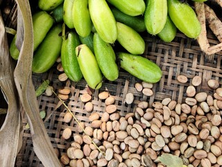 Dried mung beans are dried in woven bamboo baskets.
