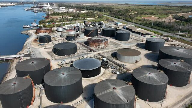 Oil terminal at port in Mobile Alabama USA. Gasoline diesel and home heating oil tanks filled for shipment at Gulf Coast.