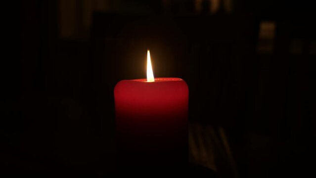 atmosphere of a lit candles at night