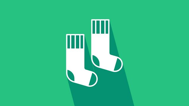 White Socks icon isolated on green background. 4K Video motion graphic animation