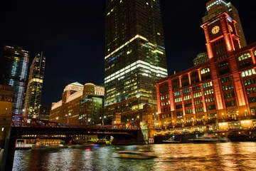  Vibrant clock tower and bridge at night in Chicago ship canals © Nicholas J. Klein