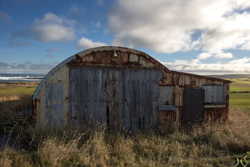 Fototapeta na wymiar Barn in a pasture, Holmsvollur, Iceland