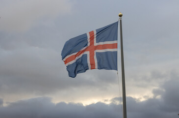 Icelandic flag outdoors and a cloudy sky
